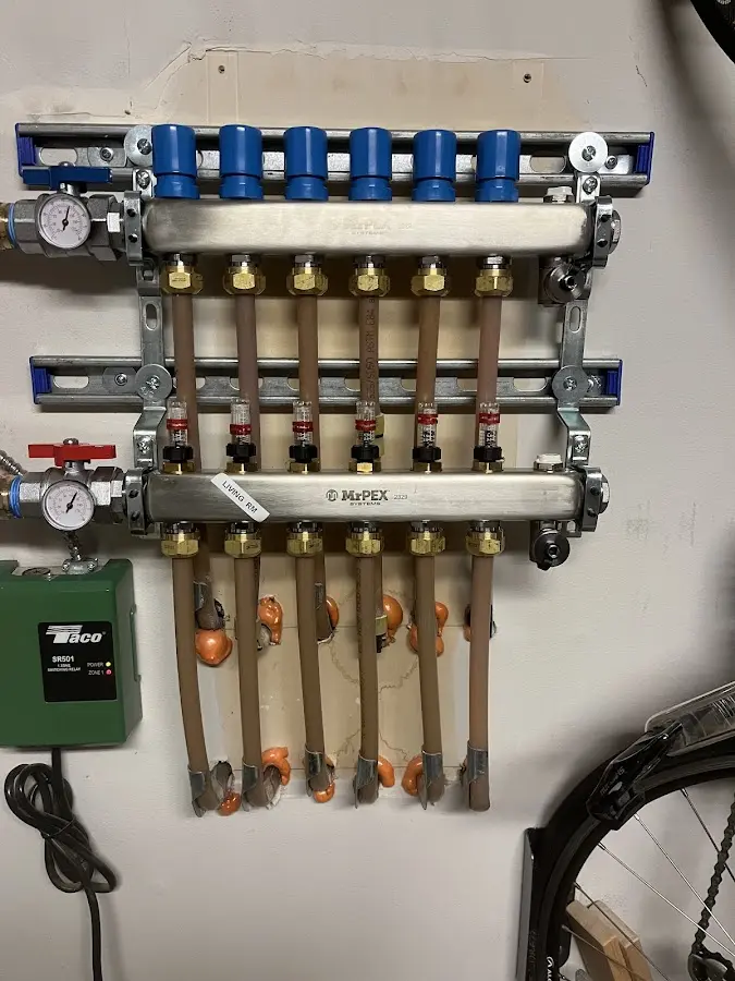 Plumber performing Water Heater Repair at a residential property in Galloway